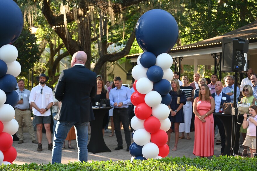Tallahassee City Commission candidate Tom Derzypolski talks to the crowd gathered at his campaign launch party on April 14, 2026.