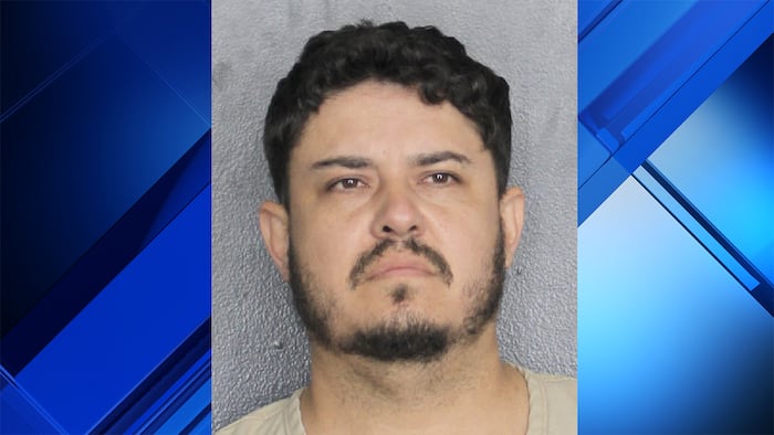 Suspect wanted on felony warrant located while painting Broward elementary school, cops say