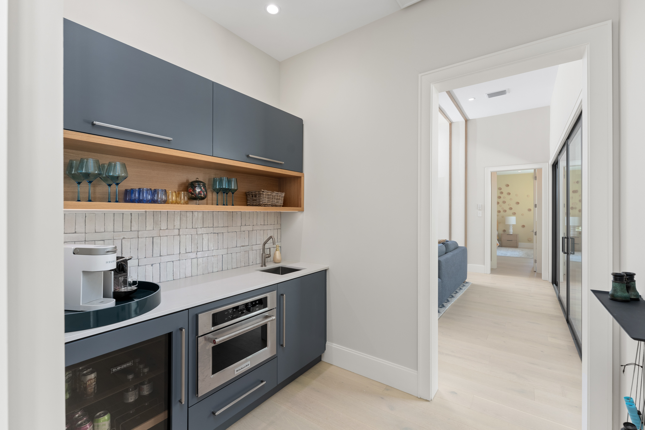 The second primary-style suite has a private living area, breakfast...