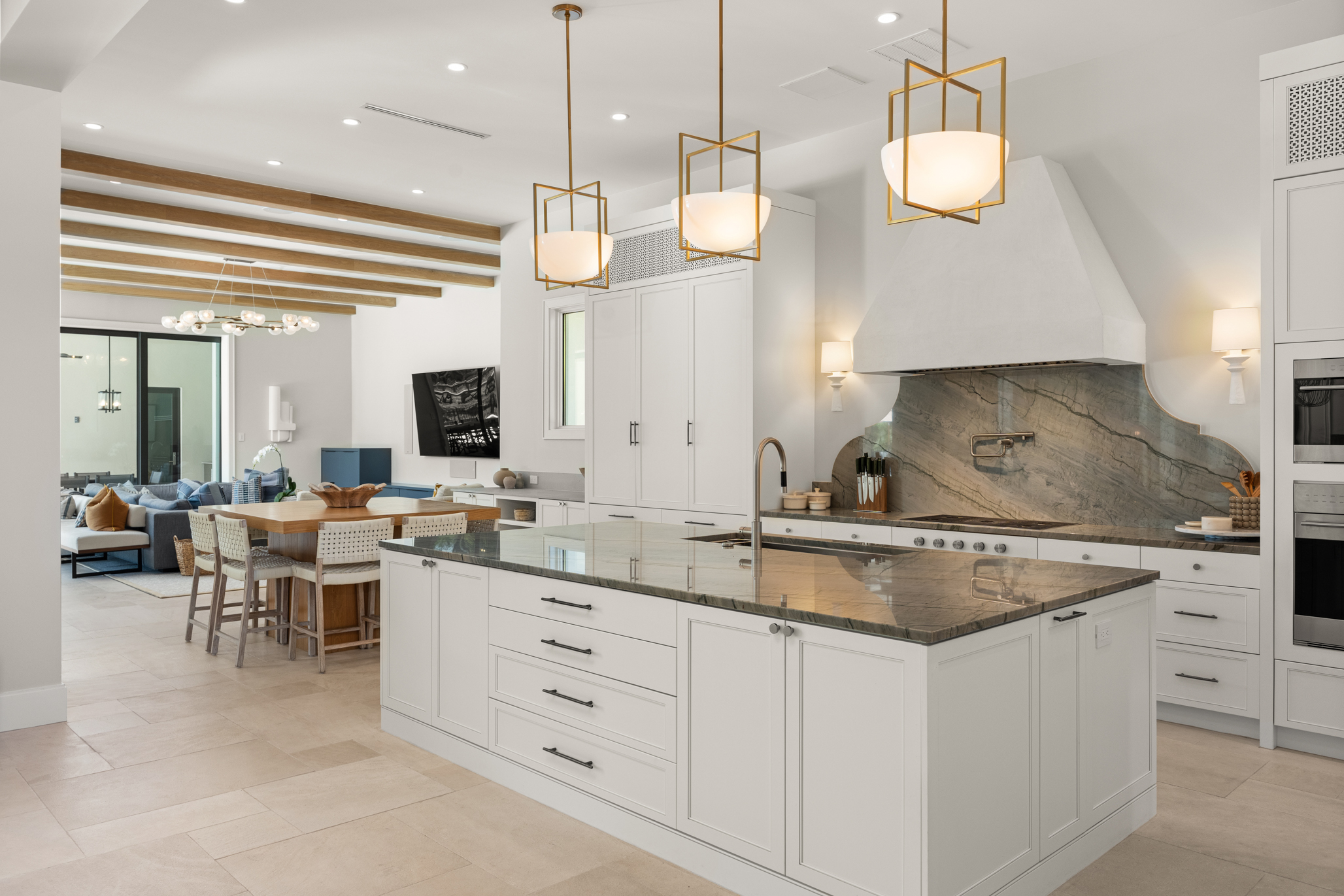 The kitchen is equipped with Sub-Zero and Wolf appliances, complemented...