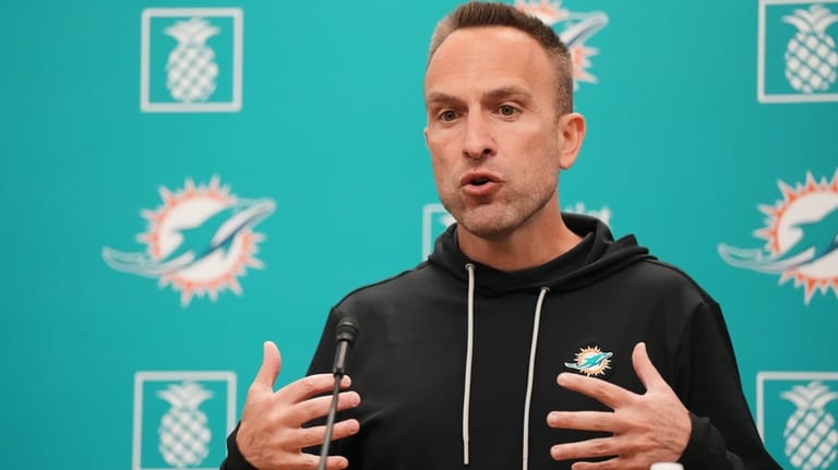 Miami Dolphins head coach Jeff Haley answers questions during an...