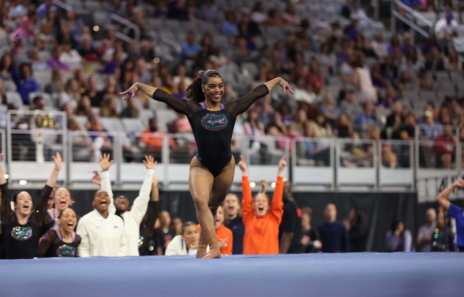Gators head coach Jenny Rowland watches her team practice on Wednesday, April 15, at Dickies Arena in Fort Worth, Texas.