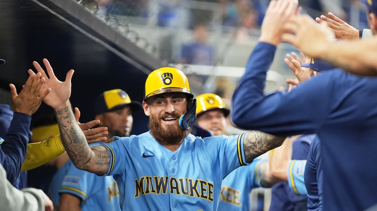 Milwaukee's Mitchell doubles in the 10th in 7-5 win over Miami
