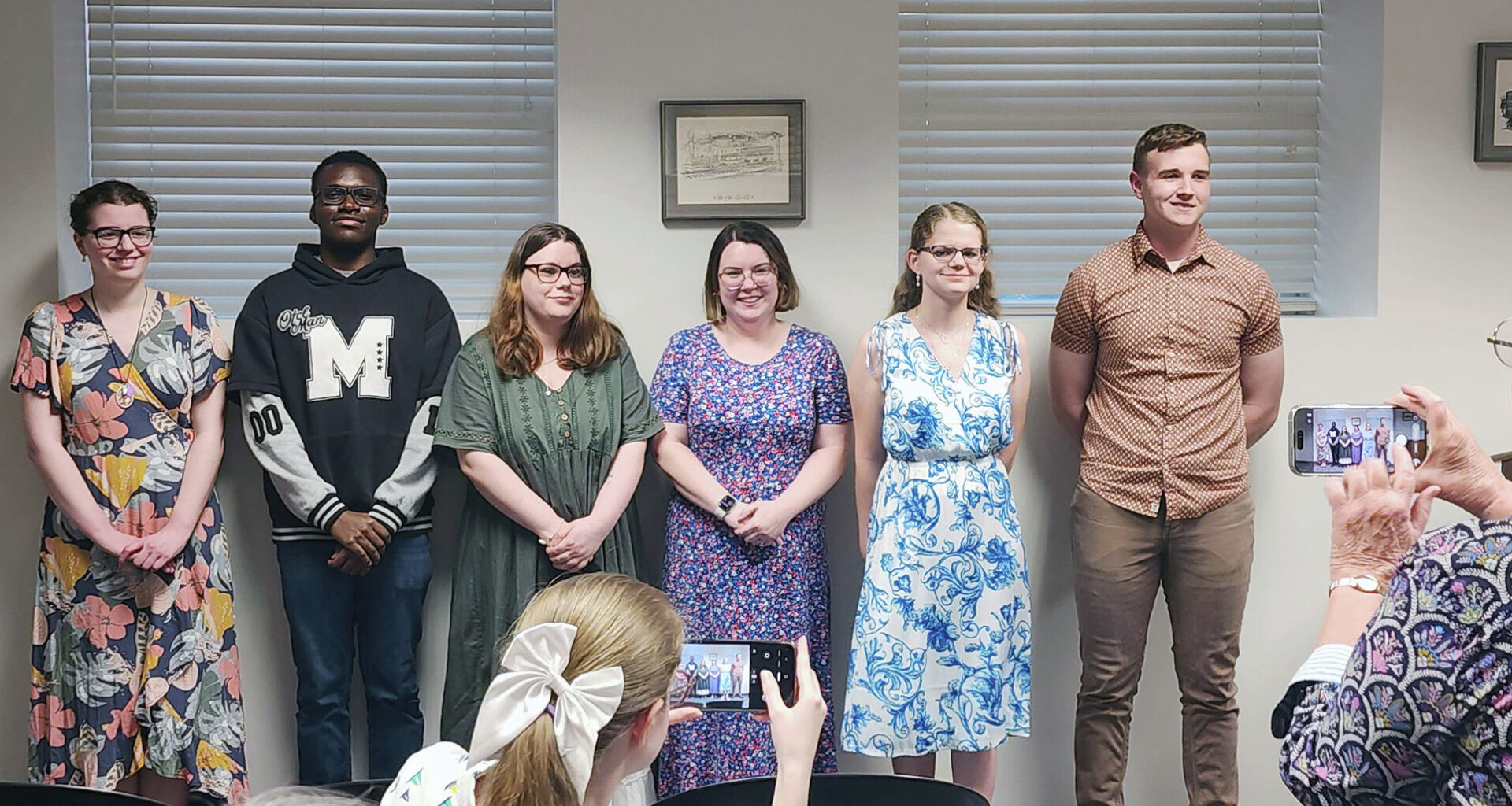 Winners in Friends of the Jacksonville Public Library's annual Author of the Year contest gather for photos during a reception in their honor. They included Hannah Garman (from left) and Emmanuel Mupeta Kabula, who tied for second in the prose category; Leslie Carmean, second in poetry; Heather Crivilare, first in prose; Lydia Tosh, first in prose; and Hayden Hamel, first in poetry. Shirley Bilyeu won third place in the poetry division.