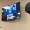 Harjinder Singh is seen on a video screen next to his attorney Tejinder Bains during court proceedings in Fort Pierce, Fla. on Thursday, Nov. 13, 2025.