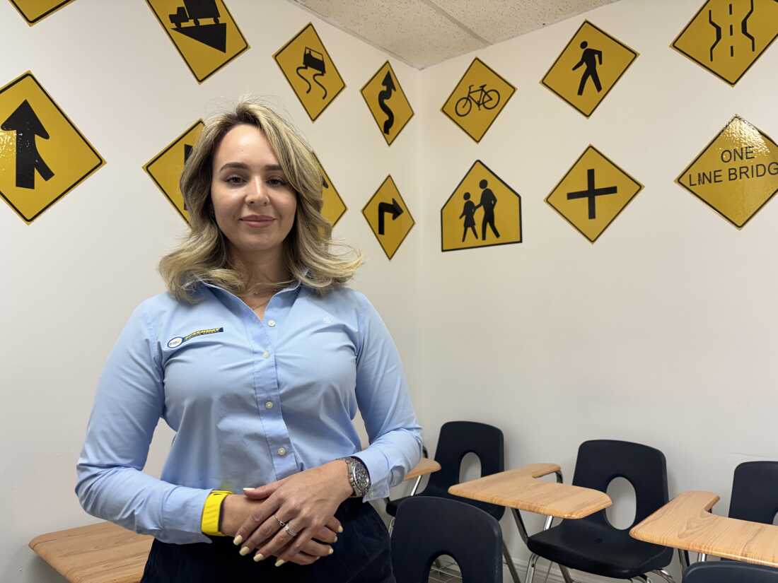 Johannes González, an instructor at Speedway Driving School in Hialeah, Florida, teaches Spanish-speaking students to memorize key words in order to pass the state's new English-only driving exam.