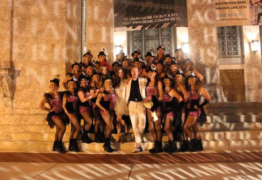 The Calendar Girls pose for picture on the steps of the Davis Art Center before the screening of their documentary in 2022.