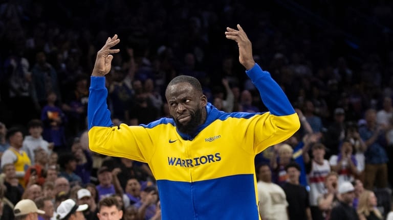 Golden State Warriors forward Draymond Green (23) gestures to the...