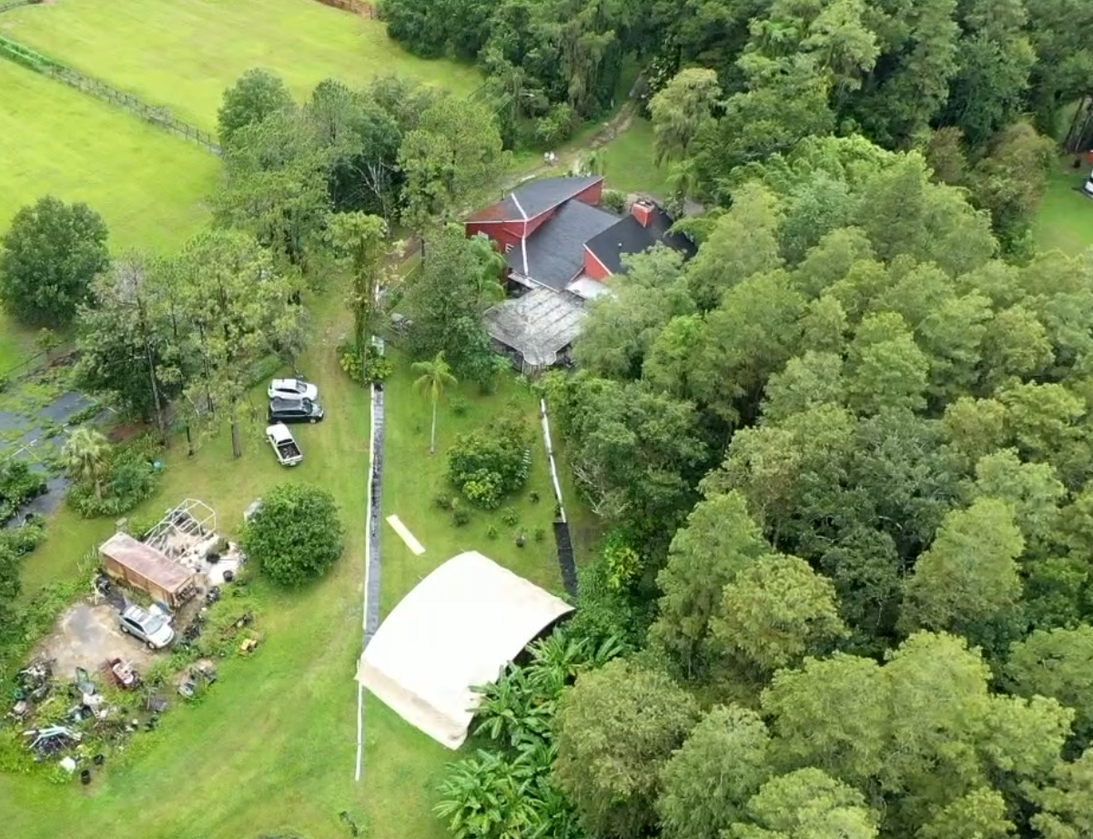 Painted shingles mark the boundaries of the easement going through Hamid Salahutdin's yard