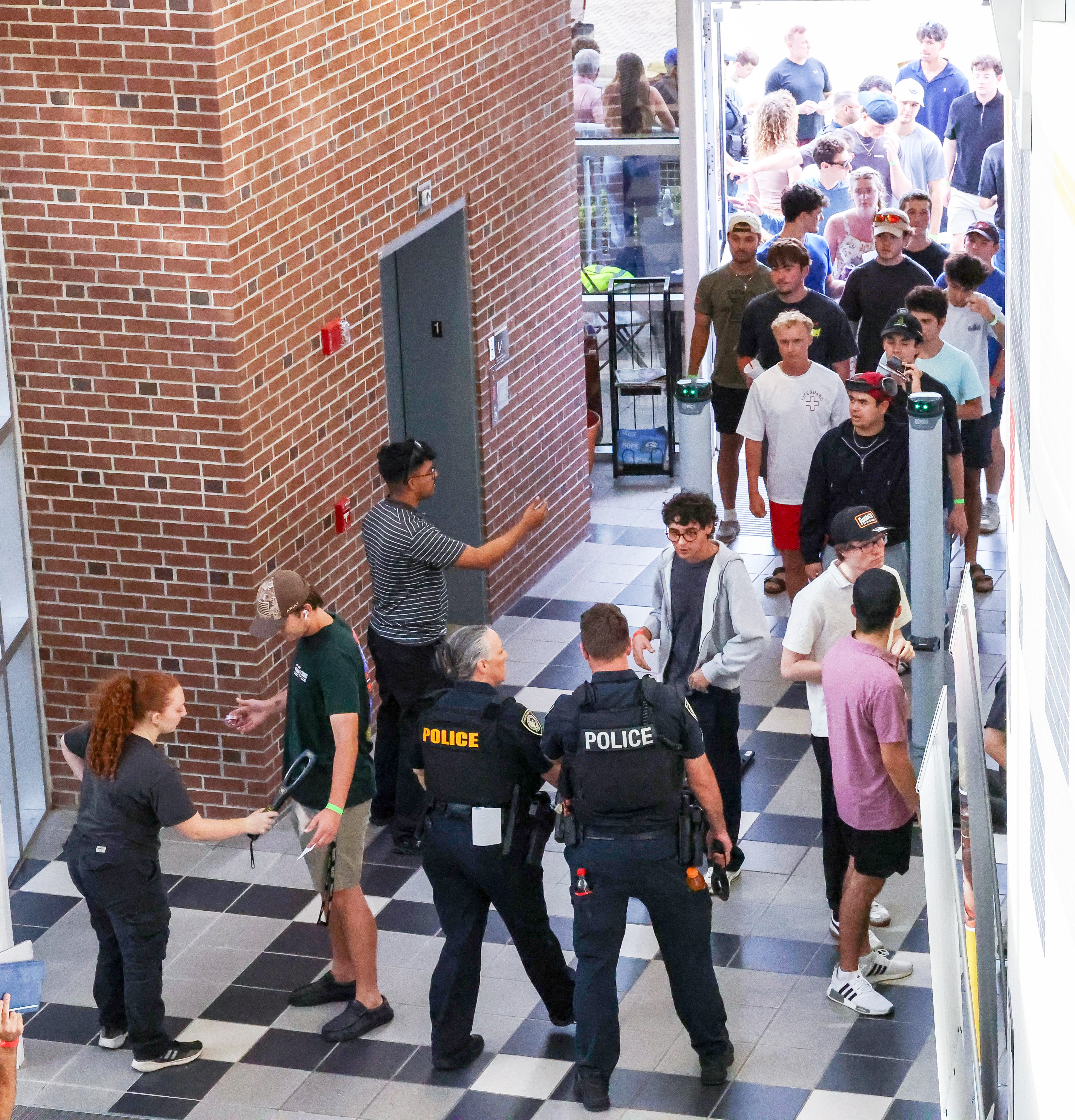 At the University of Central Florida, student go through security...