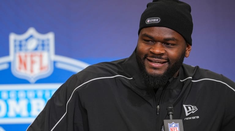 Florida defensive lineman Caleb Banks (02) speaks during a press...