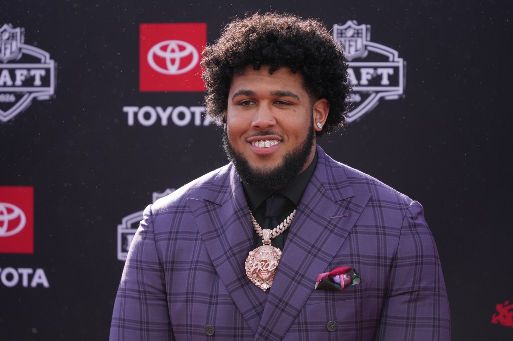 Dolphins pick Alabama OL Kadyn Proctor after trade down