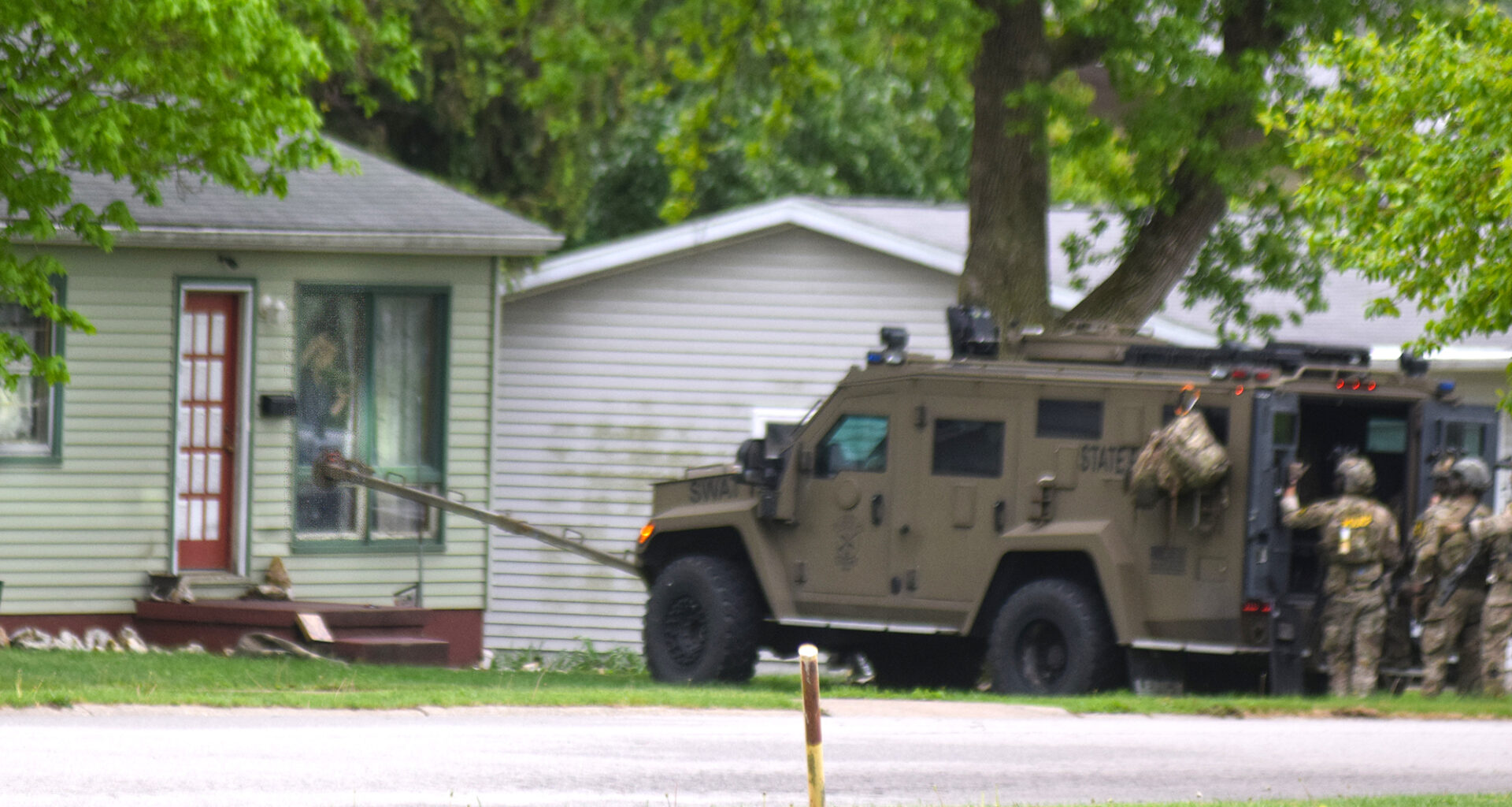 Barricaded man surrenders after hours-long police standoff