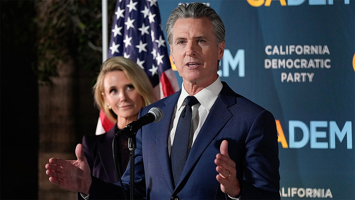 California Gov. Gavin Newsom speaking at a press conference in Sacramento