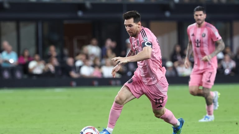 Inter Miami forward Lionel Messi (10) attacks with the ball...