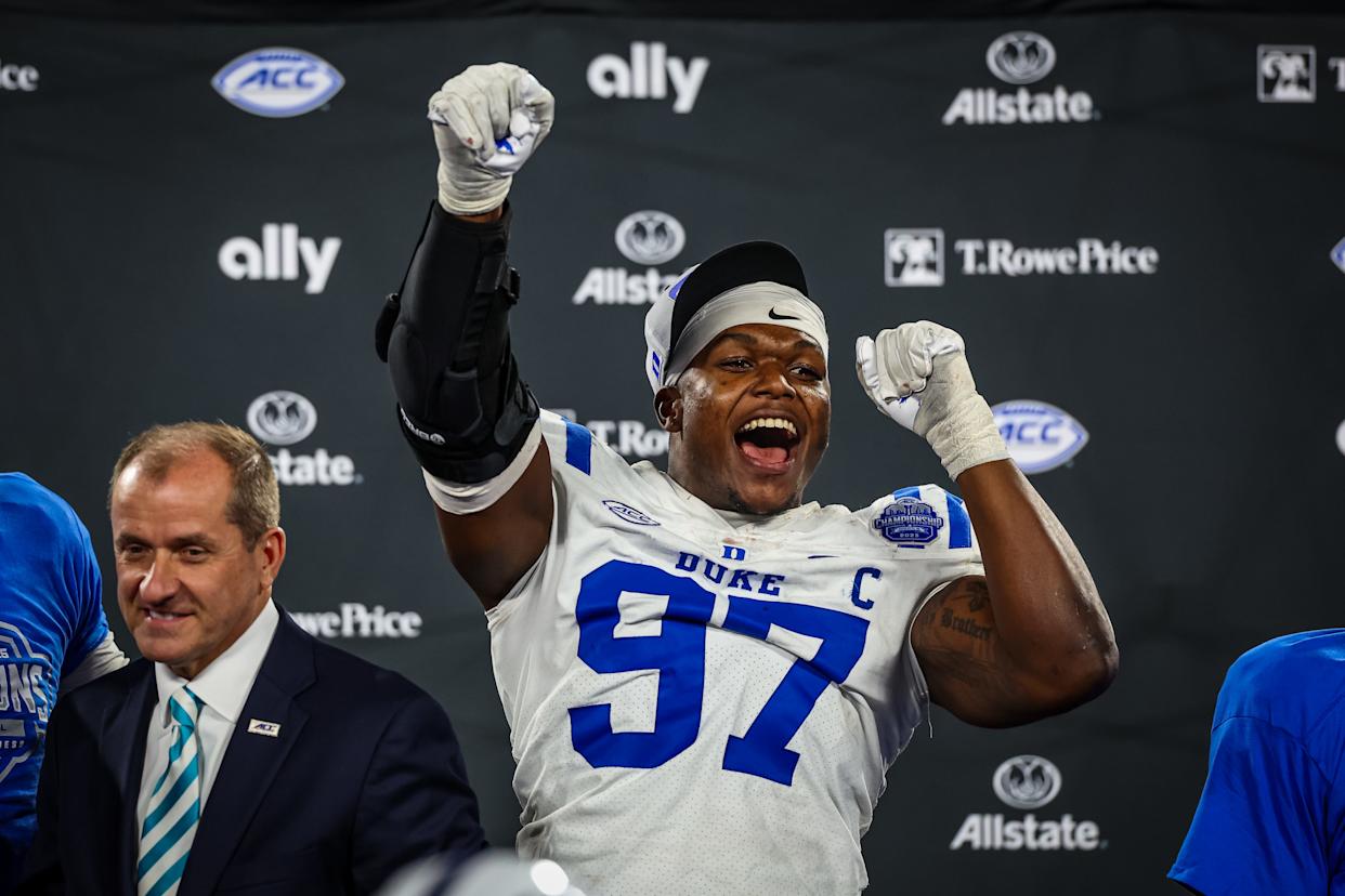 CHARLOTTE, NORTH CAROLINA - DECEMBER 06: Wesley Williams #97 of the Duke Blue Devils celebrates after the 2025 ACC Football Championship against the Virginia Cavaliers at Bank of America Stadium on December 06, 2025 in Charlotte, North Carolina. (Photo by David Jensen/Getty Images)