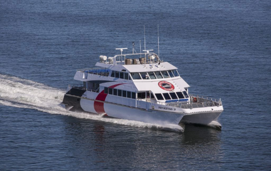 Ferry speeding through the water