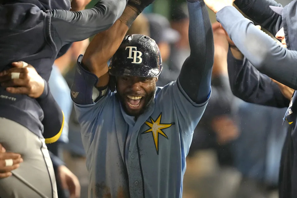 PITTSBURGH, PA - APRIL 18: <a class="link " href="https://sports.yahoo.com/mlb/players/10849/" data-i13n="sec:content-canvas;subsec:anchor_text;elm:context_link" data-ylk="slk:Cedric Mullins;sec:content-canvas;subsec:anchor_text;elm:context_link;itc:0" data-yga="{"yLinkElement":"context_link","yModuleName":"content-canvas","yLinkText":"Cedric Mullins","ySubModuleName":"anchor_text","yHasCommerce":false}">Cedric Mullins</a> #31 of the <a class="link " href="https://sports.yahoo.com/mlb/teams/tampa-bay/" data-i13n="sec:content-canvas;subsec:anchor_text;elm:context_link" data-ylk="slk:Tampa Bay Rays;sec:content-canvas;subsec:anchor_text;elm:context_link;itc:0" data-yga="{"yLinkElement":"context_link","yModuleName":"content-canvas","yLinkText":"Tampa Bay Rays","ySubModuleName":"anchor_text","yHasCommerce":false}">Tampa Bay Rays</a> celebrates with teammates after hitting a two-run home run in the thirteenth inning during a baseball game against the <a class="link " href="https://sports.yahoo.com/mlb/teams/pittsburgh/" data-i13n="sec:content-canvas;subsec:anchor_text;elm:context_link" data-ylk="slk:Pittsburgh Pirates;sec:content-canvas;subsec:anchor_text;elm:context_link;itc:0" data-yga="{"yLinkElement":"context_link","yModuleName":"content-canvas","yLinkText":"Pittsburgh Pirates","ySubModuleName":"anchor_text","yHasCommerce":false}">Pittsburgh Pirates</a> at PNC Park on April 18, 2026 in Pittsburgh, Pennsylvania. (Photo by Mitchell Layton/Getty Images) | Getty Images