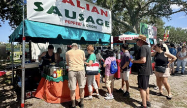 People waiting in line to get food at of park