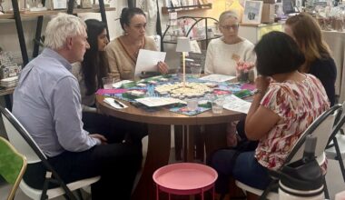 A group playing mahjong at Coastal Elements.