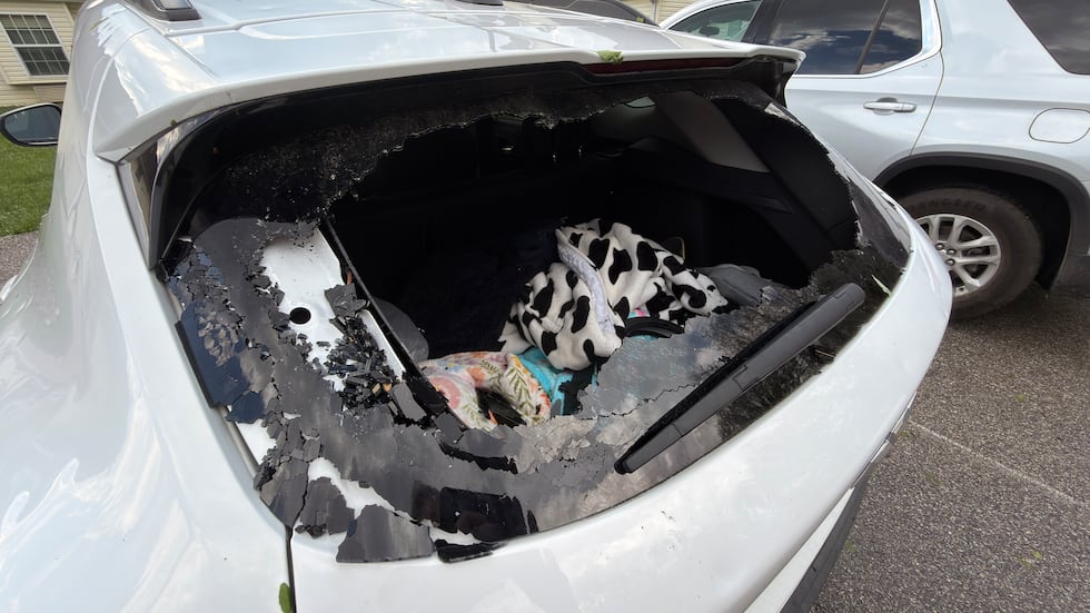 Hail shatters the back window of an SUV in Osawatomie on April 15, 2026.