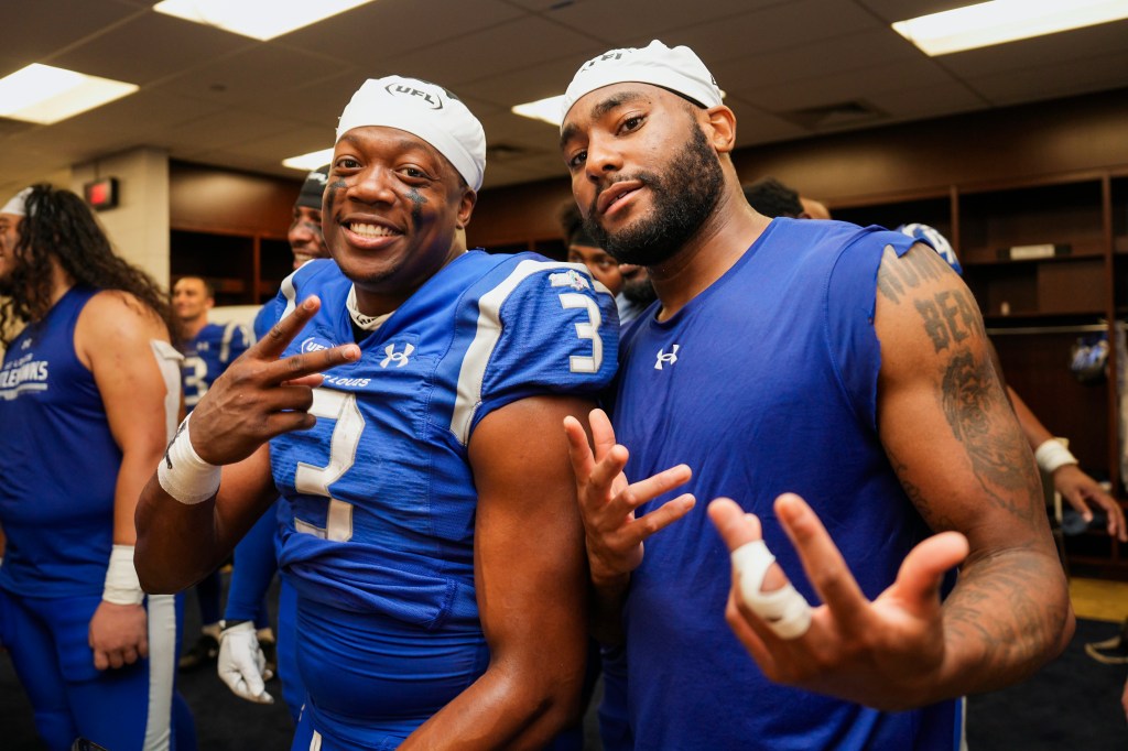 Football players Chris Payton-Jones and Nick Whiteside posing for a photo.