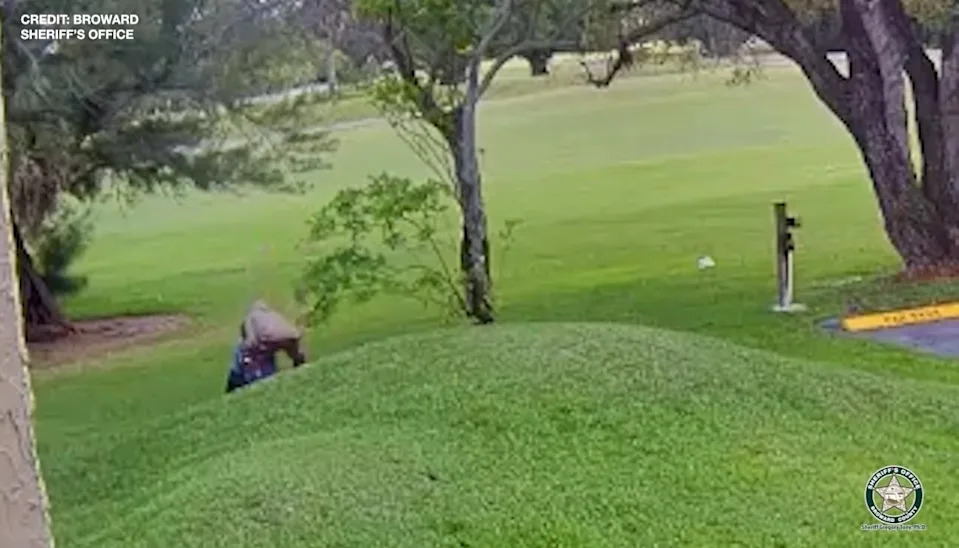 The man tackled the victim down the hill, but she wrestled him off, according to the footage.