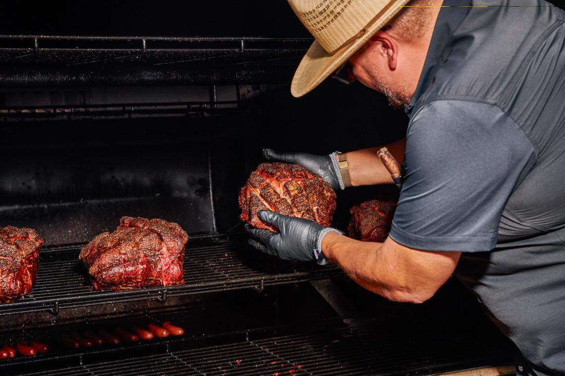Mel Rodriguez slow-smokes the meat in an M&M BBQ Company pit.