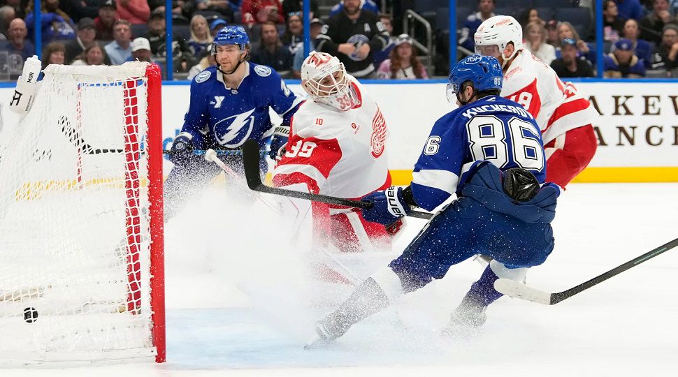 Tampa Bay Lightning right wing Nikita Kucherov (86) scores past Detroit Red Wings goaltender Cam Talbot (39) in overtime during an NHL hockey game Monday, April 13, 2026, in Tampa, Fla. (AP Photo/Chris O'Meara)