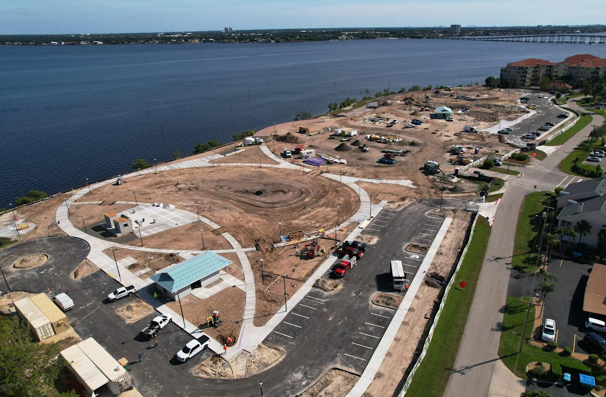 This aerial view of Jaycee Park in Cape Coral was captured in the afternoon of Nov. 12, 2025. The park is currently closed for renovations, with a projected completion date of April 2026. Recent progress includes framing for the overlook boardwalk, pouring the bistro building's foundation, and filling concrete blocks for the bandshell and restrooms. Upcoming work includes the construction of the south weir, underground plumbing, and playground installation.