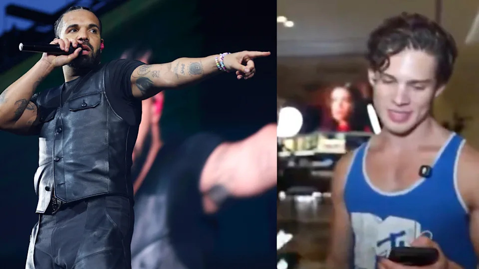 Drake performing on stage, wearing a black vest and holding a microphone. Beside him, Clavicular in a blue tank top looks at his phone.