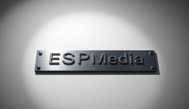 A polished metal nameplate with the text