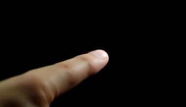 An extreme close-up of a gun trigger and finger against a stark black background, conveying the sudden, gritty tension of the reported incident.