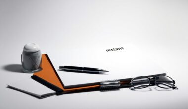 A minimalist, high-contrast studio still life photograph featuring a neatly arranged collection of office supplies and job search materials, symbolizing the serious and focused nature of the job search process.