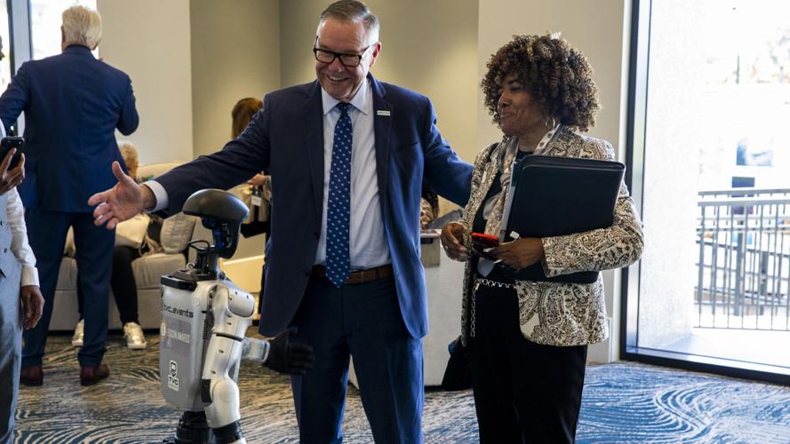 Attendees interact with robot at Edison Awards