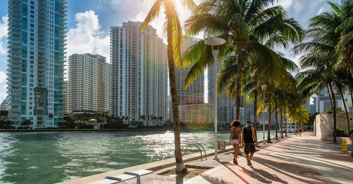 downtown miami people walking along miami river