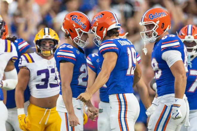 Sep 13, 2025; Baton Rouge, Louisiana, USA; Florida Gators place kicker Trey Smack (29) and punter Tommy Doman (19) celebrate a field goal against the LSU Tigers during the first half at Tiger Stadium. Mandatory Credit: Stephen Lew-Imagn Images