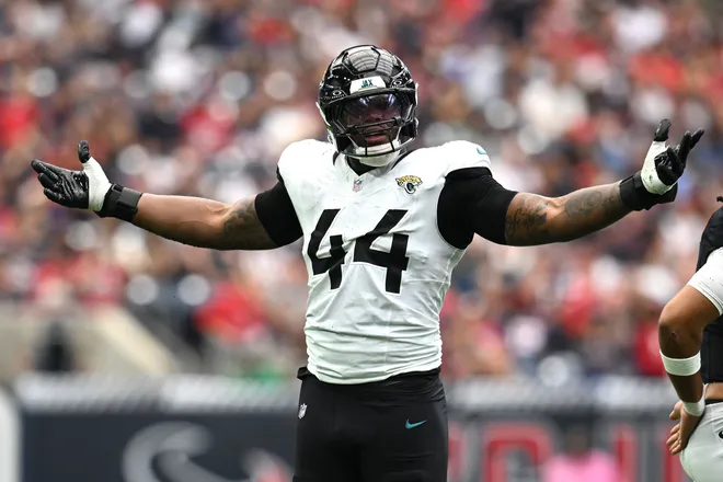 HOUSTON, TEXAS - SEPTEMBER 29: Travon Walker #44 of the Jacksonville Jaguars reacts during the first half of the game against the Houston Texans at NRG Stadium on September 29, 2024 in Houston, Texas. (Photo by Jack Gorman/Getty Images)