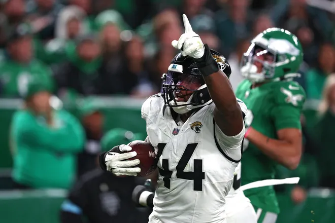 PHILADELPHIA, PENNSYLVANIA - NOVEMBER 03: Travon Walker #44 of the Jacksonville Jaguars celebrates after returning a fumble for a touchdown in the third quarter of a game against the Philadelphia Eagles at Lincoln Financial Field on November 03, 2024 in Philadelphia, Pennsylvania. (Photo by Elsa/Getty Images)