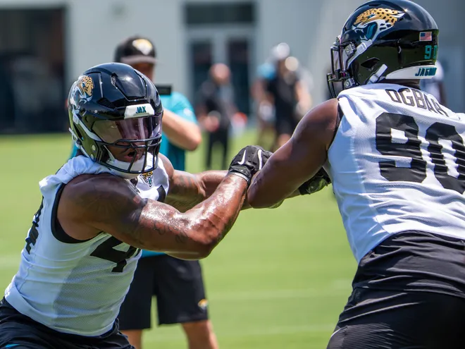 Jacksonville Jaguars defensive end Travon Walker (44) runs drills with Jacksonville Jaguars defensive lineman Emmanuel Ogbah (90) during the fourth organized team activity at the Miller Electric Center in Jacksonville, Fla. Tuesday, May 27, 2025. [Doug Engle/Florida Times-Union]