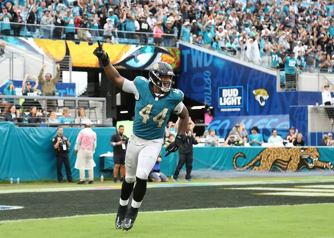 JACKSONVILLE, FLORIDA - OCTOBER 06: Travon Walker #44 of the Jacksonville Jaguars celebrates during the fourth quarter of a game against the Indianapolis Colts at EverBank Stadium on October 06, 2024 in Jacksonville, Florida. (Photo by Courtney Culbreath/Getty Images)