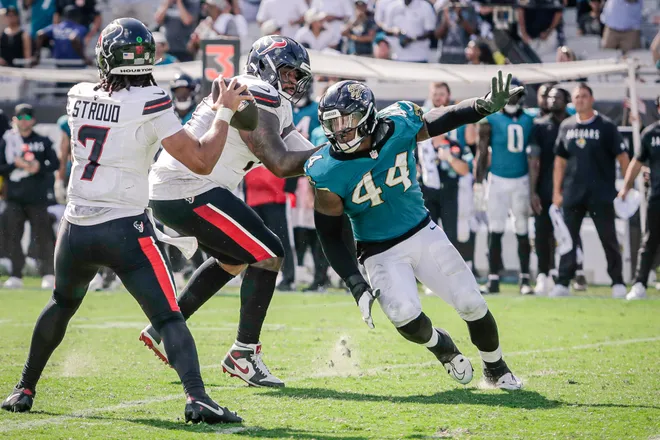 Sep 21, 2025; Jacksonville, Florida, USA; Jacksonville Jaguars defensive end Travon Walker (44) pressures the quarterback against the Houston Texans at EverBank Stadium. Mandatory Credit: Travis Register-Imagn Images