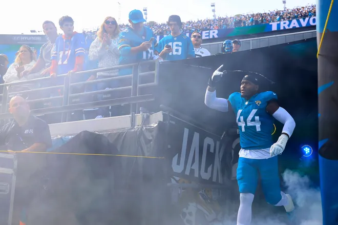 Jacksonville Jaguars defensive end Travon Walker (44) is introduced before an NFL football AFC Wild Card playoff matchup, Sunday, Jan. 11, 2026, in Jacksonville, Fla. The Bills defeated the Jaguars 27-24. [Corey Perrine/Florida Times-Union]