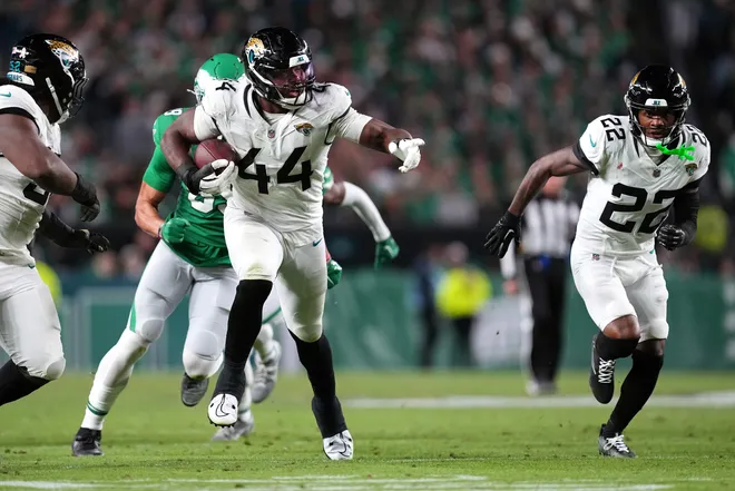 PHILADELPHIA, PENNSYLVANIA - NOVEMBER 03: Travon Walker #44 of the Jacksonville Jaguars returns a fumble for a touchdown in the third quarter of a game against the Philadelphia Eagles at Lincoln Financial Field on November 03, 2024 in Philadelphia, Pennsylvania. (Photo by Mitchell Leff/Getty Images)
