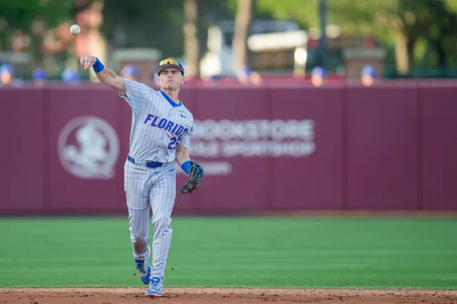 Florida Gators infielder Kolt Myers (25) throws to first. The Florida State Seminoles hosted the Florida Gators at Dick Howser Stadium on Tuesday, April 7, 2026.