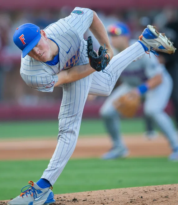 Florida Gators pitcher Cooper Walls (38) pitches to a batter. The Florida State Seminoles hosted the Florida Gators at Dick Howser Stadium on Tuesday, April 7, 2026.