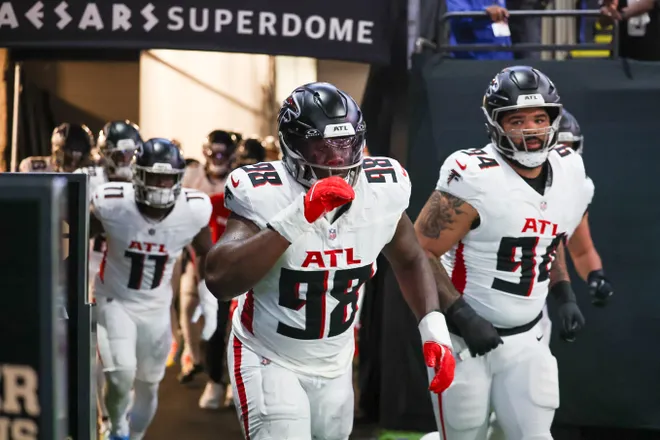 Nov 23, 2025; New Orleans, Louisiana, USA; Atlanta Falcons defensive tackle Ruke Orhorhoro (98) takes the field prior to a game against the New Orleans Saints at Caesars Superdome. Mandatory Credit: Stephen Lew-Imagn Images