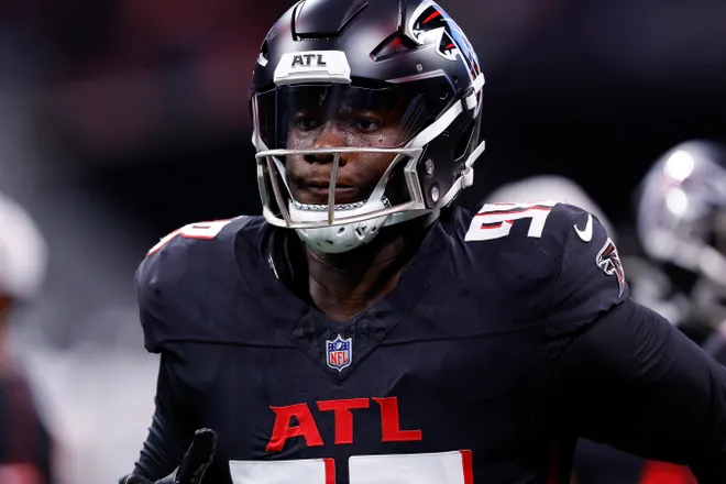ATLANTA, GEORGIA - AUGUST 23: Ruke Orhorhoro #98 of the Atlanta Falcons warms up prior to the preseason game against the Jacksonville Jaguars at Mercedes-Benz Stadium on August 23, 2024 in Atlanta, Georgia. (Photo by Todd Kirkland/Getty Images)
