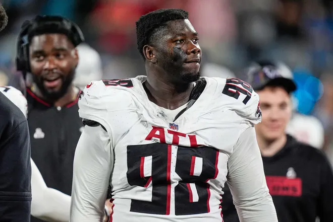 Oct 13, 2024; Charlotte, North Carolina, USA; Atlanta Falcons defensive tackle Ruke Orhorhoro (98) during the second half at Bank of America Stadium. Mandatory Credit: Jim Dedmon-Imagn Images