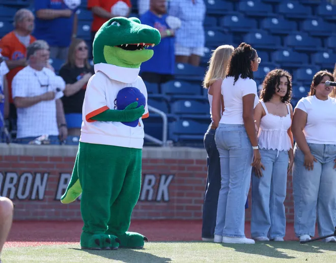 Florida mascot Albert sings the national anthem before an NCAA baseball game at Condron Family Ballpark in Gainesville, FL on Friday, April 17, 2026. [Alan Youngblood/Gainesville Sun]